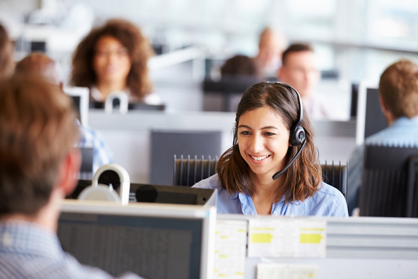 Office staff assisting customers over the phone