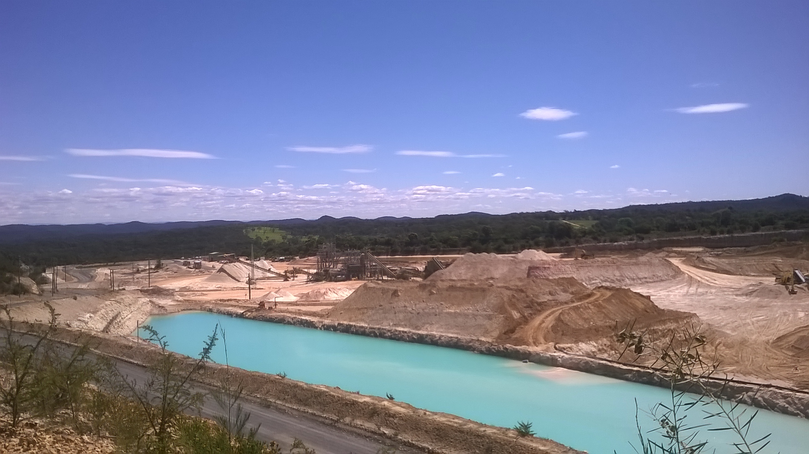 Calga quarry landscape with blue water and surrounding land
