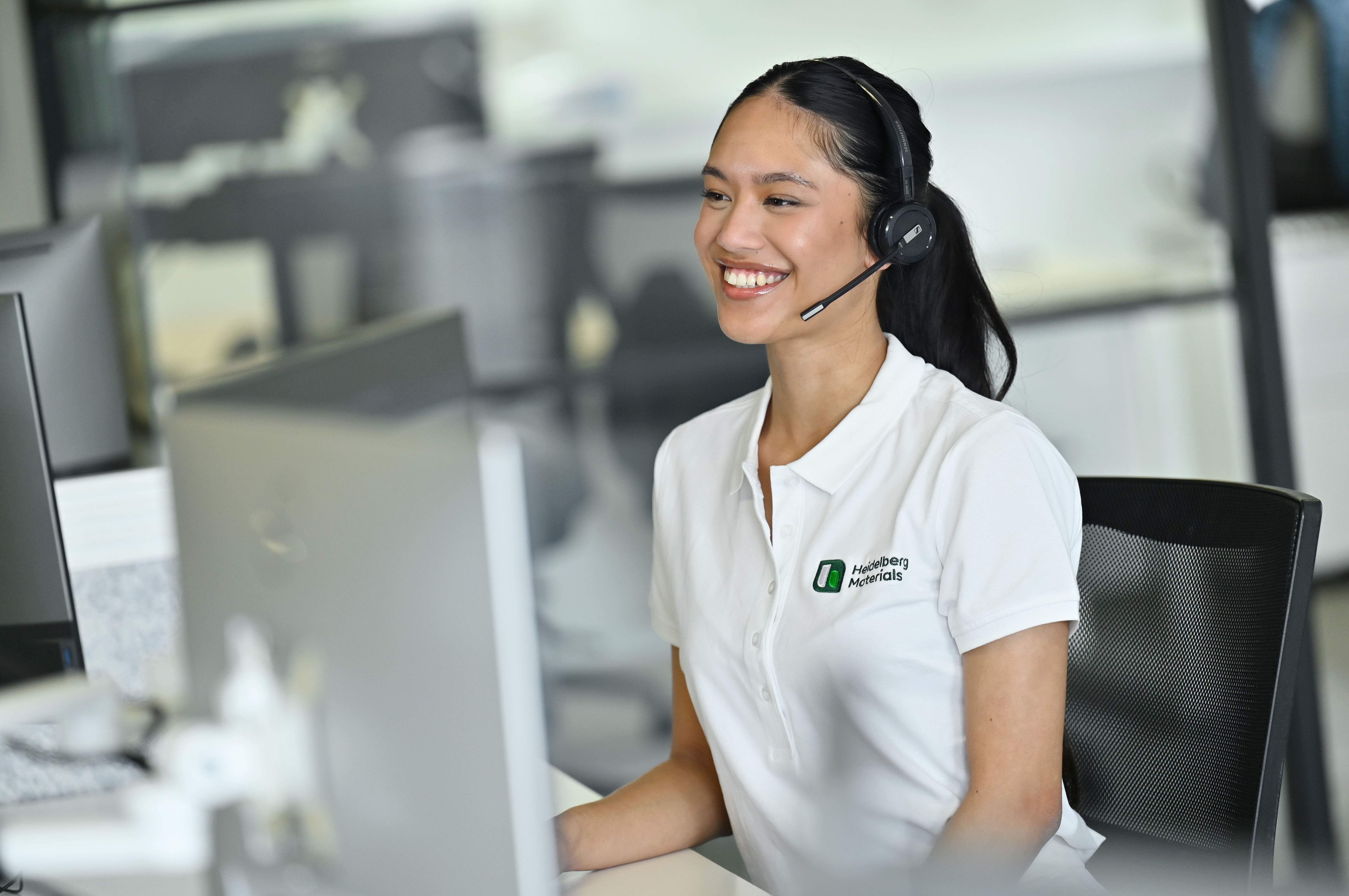 Customer service team member in front of computer
