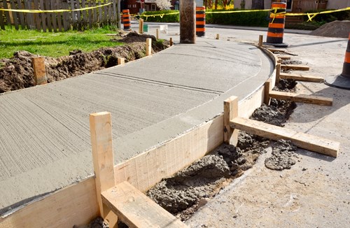 Easycrete concrete product being smoothed during construction