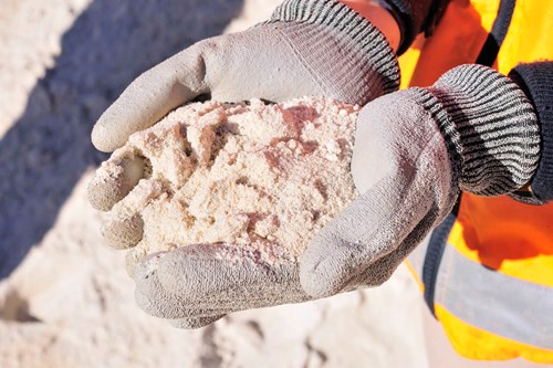 Pack n Pave fine aggregate being held in hands
