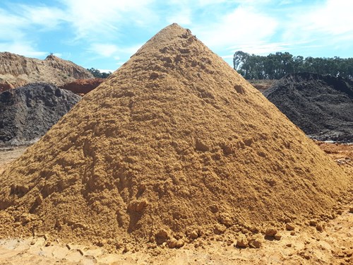 Screened red brick sand stockpile