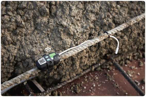 Close-up of ground sensor installation in roadbed