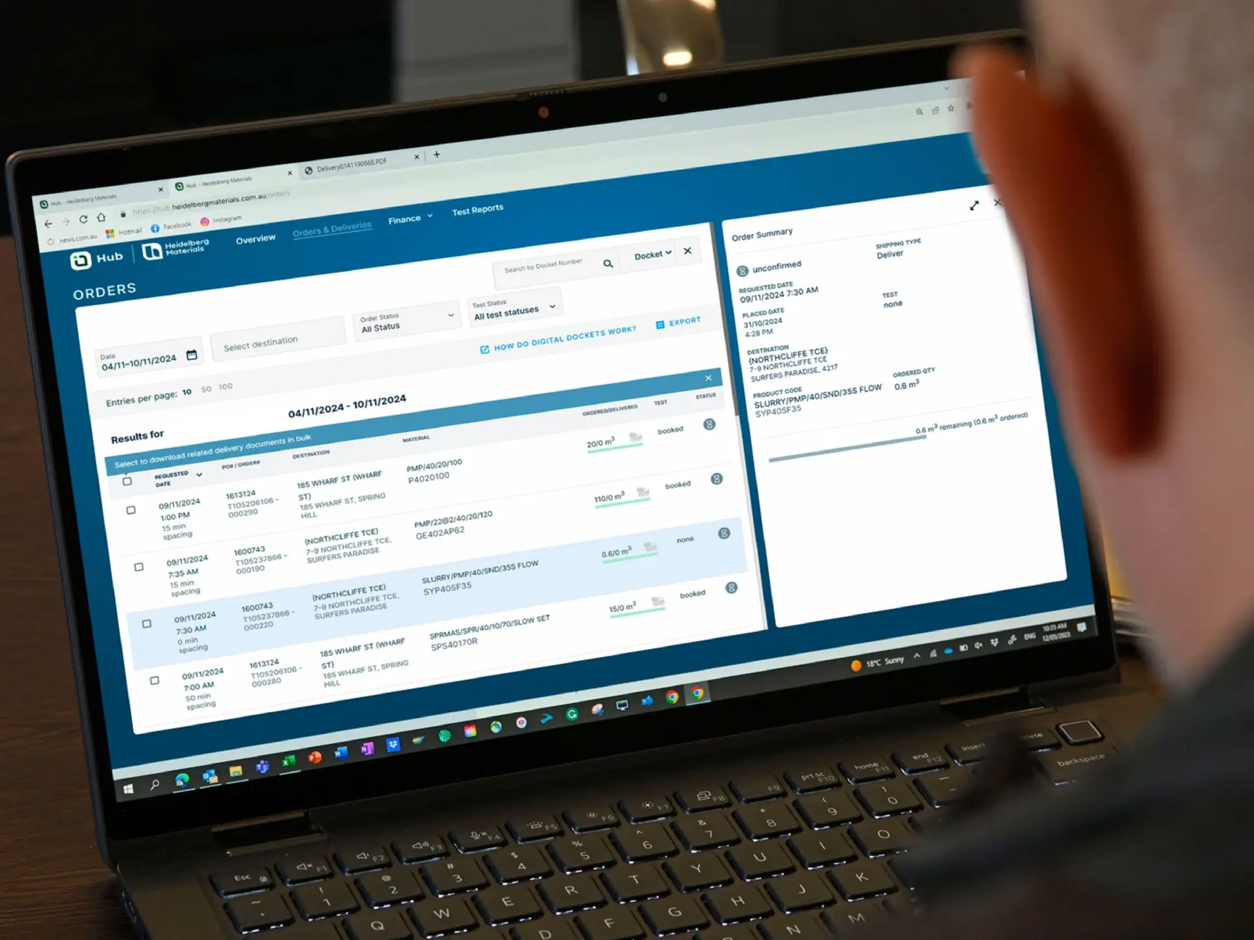 Man reviewing upcoming orders on Heidelberg Materials Hub portal